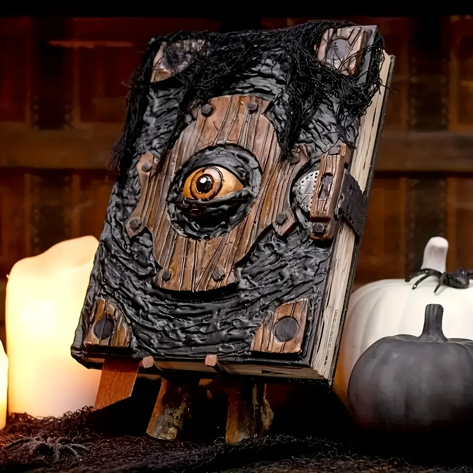 

‌Evil Eye Horror Book Resin Statue‌ - Spooky Halloween Decor for Home & Office