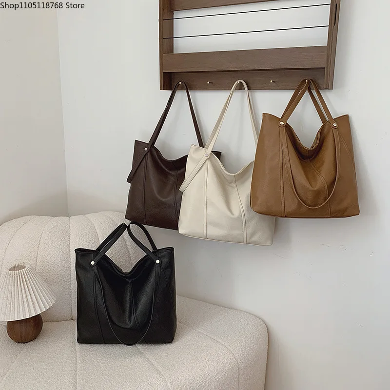 

Niche Design Fashion Commuter Tote Bag High-end Sense Large-capacity Portable Shoulder Bag