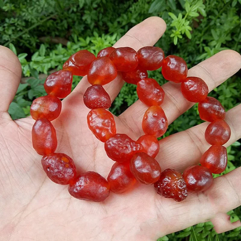 

Factory Price Supply Alashan Raisin Rough Stone Cherry Red Sugar Heart Agate Bracelet