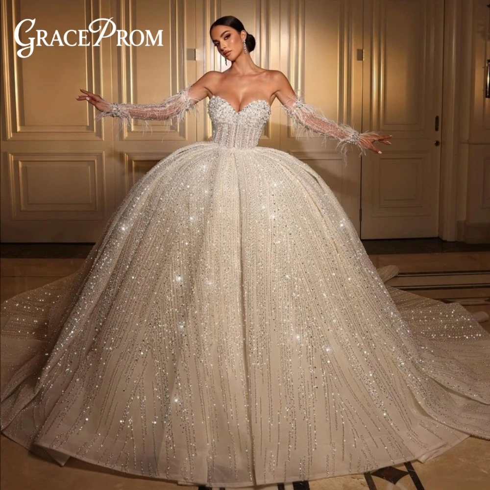 

Handmade Crystal Beaded Wedding Dress Feather Long Sleeves Sweetheart Neckline Luxury Shiny Ball Gown Bridal Dress Custom Fit