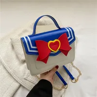 Bolso cruzado de cuero sintético con lazo elegante, bolso de mano con corazón pequeño Kawaii, Mini monederos, bolso de hombro con cinturón de cadena para chica adolescente a la moda