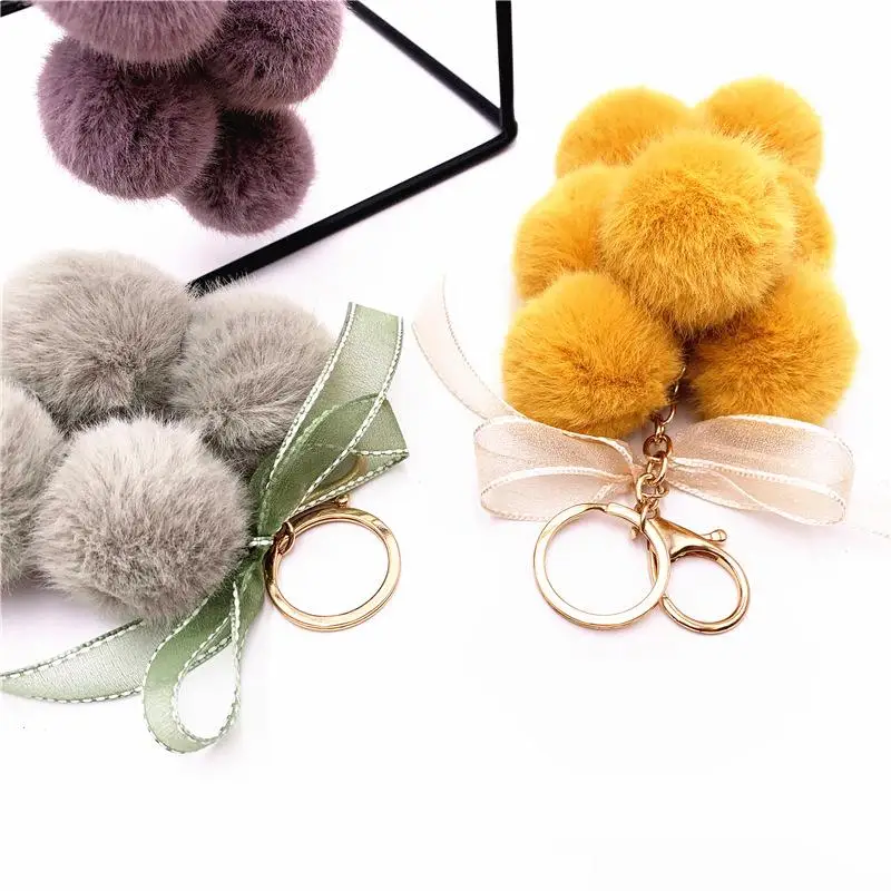 Lindo creativo uva fruta encaje arco Bola de piel muñeco de peluche juguete llavero colgante bolsa colgante mochila encanto coche llavero regalo de Año Nuevo