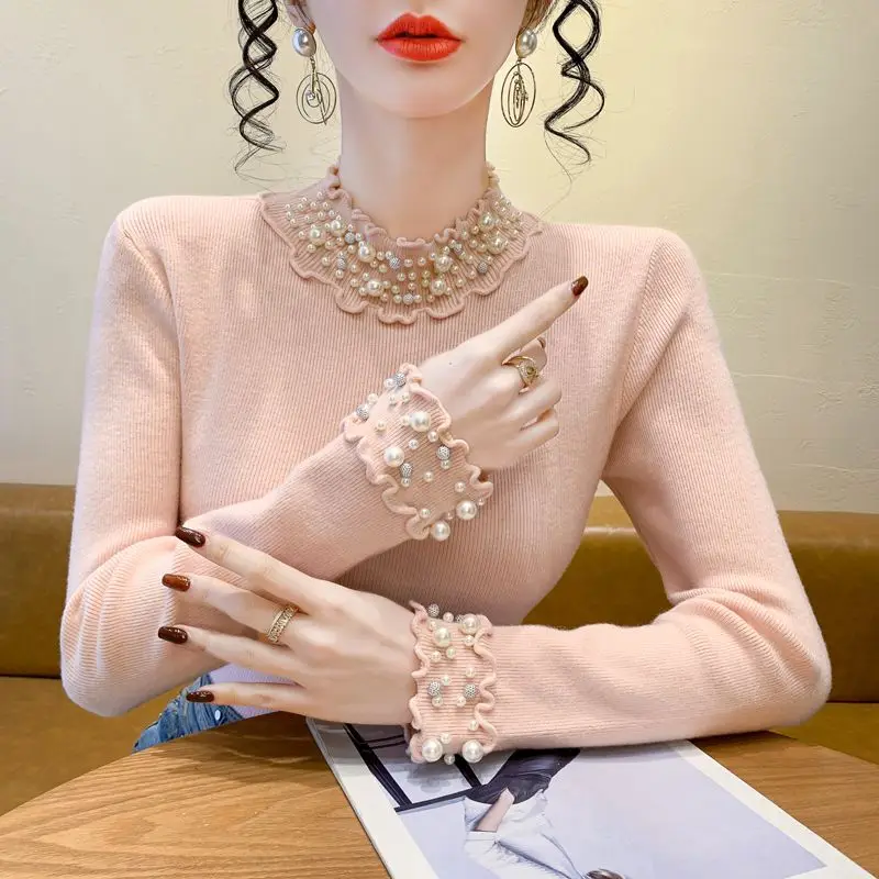 الكورية نمط شتاء جديد شبه عالية الياقة الدانتيل الصناعة الثقيلة مسمار حبة سميكة محبوك سترة المرأة أنيقة التخسيس