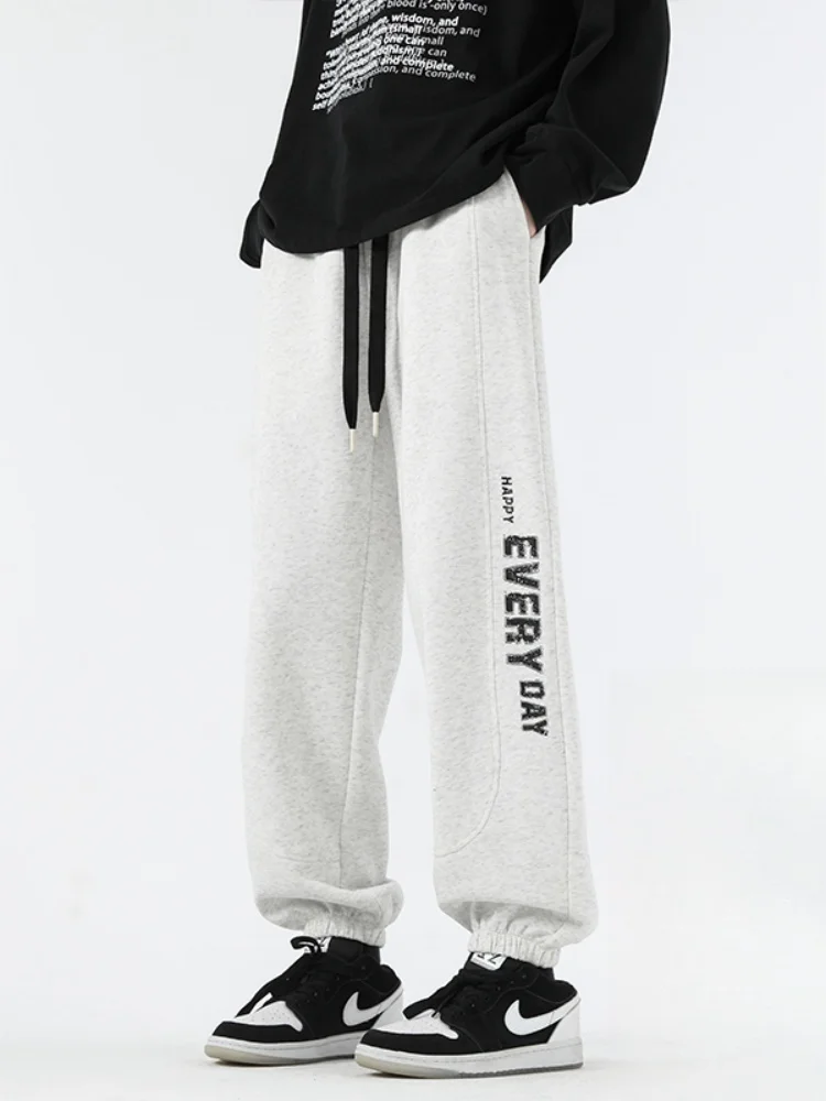 

Мужские зимние утепленные спортивные брюки с принтом, свободные повседневные длинные брюки, молодежные модные брендовые брюки с эластичным поясом