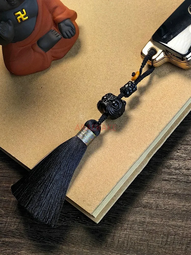 Ciondolo danza del leone in ebano fatto a mano in stile cinese, accessori per telefoni cellulari con nappe fatte a mano, accessori chiave