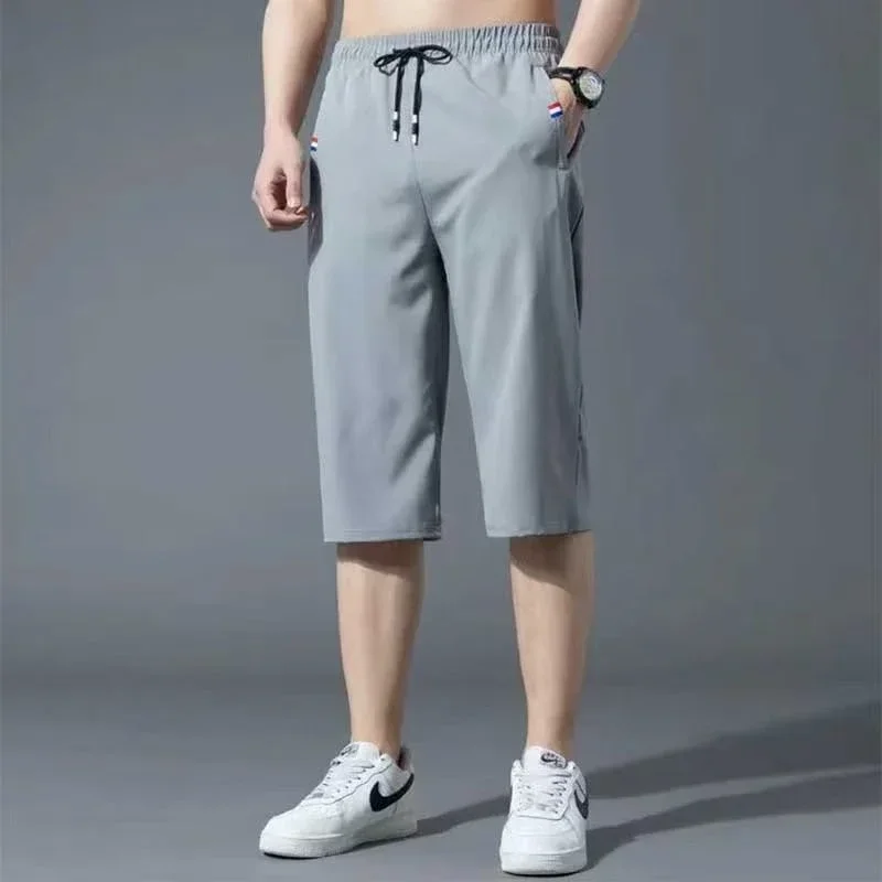 Sport Loose Over Silk Knee Length Pants 2025 Men New Summer Thin Shorts Male Casual Quick Dry Ice Silk Zipper Pocket Capri Pants