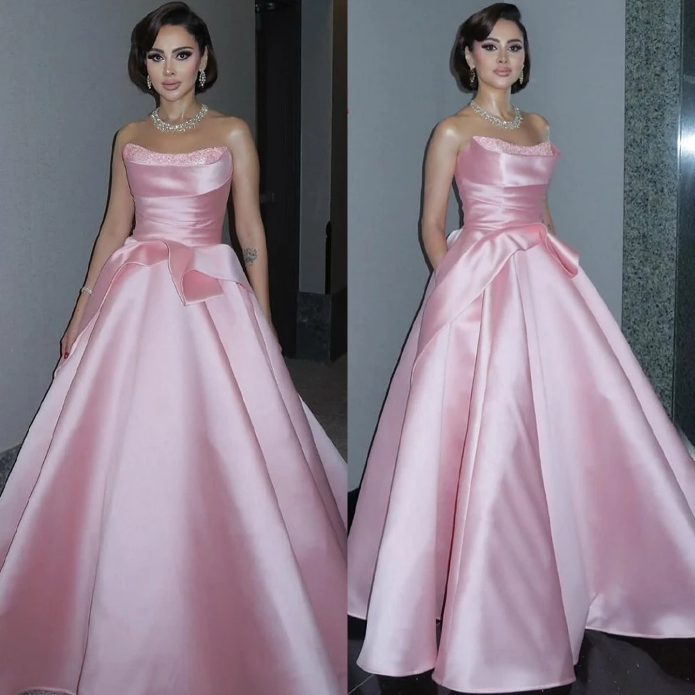 فستان سهرة رائع من الساتان الوردي مخصص بدون حمالات فساتين المشاهير أنيقة على شكل حرف a للحفلات على الطراز الحديث بدون أكمام