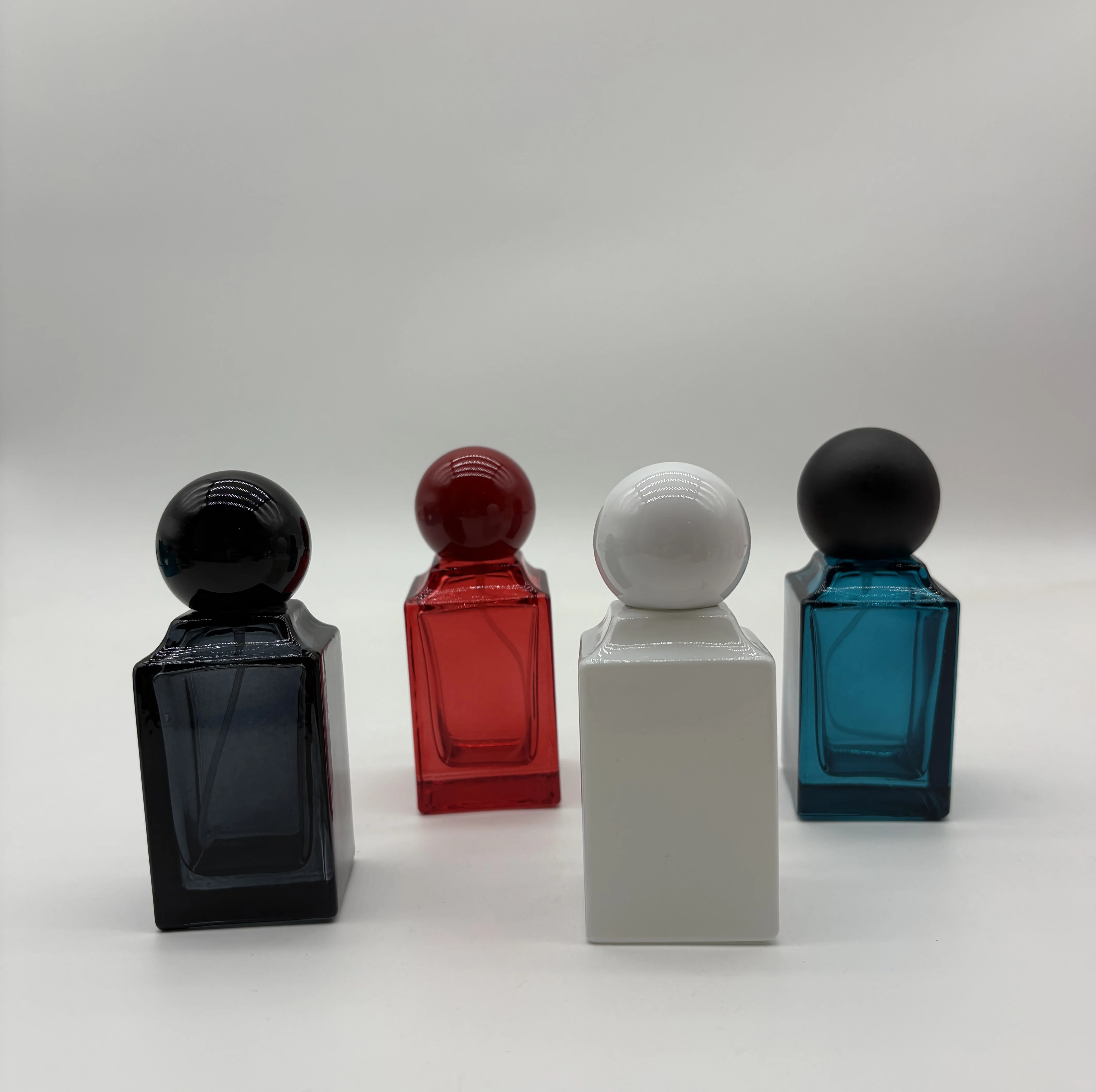 

4Pcs 50ml Colored Glass Perfume Bottles with Ball Caps, Luxurious Perfume Bottles for Dispensing Empty Bottles