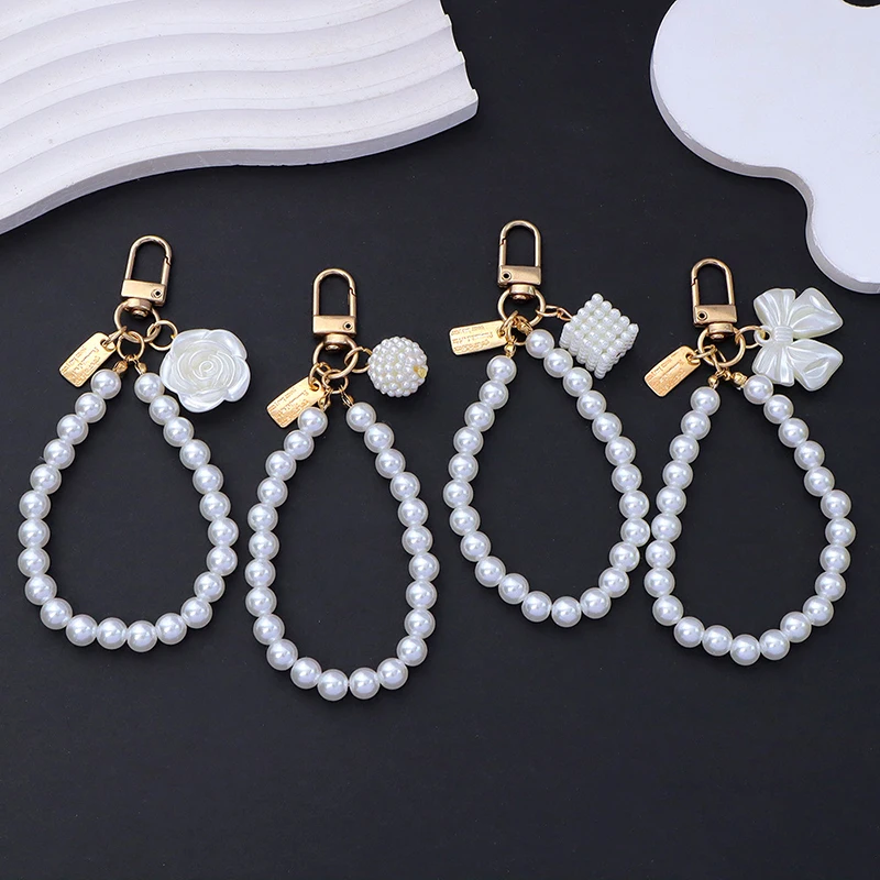 

2Pcs Fashion Rose Flower Bow Pendant Key Ring Phone Anti-Loss Pearl Chain Wristband For Women Mobile Phone Short Wrist Strap