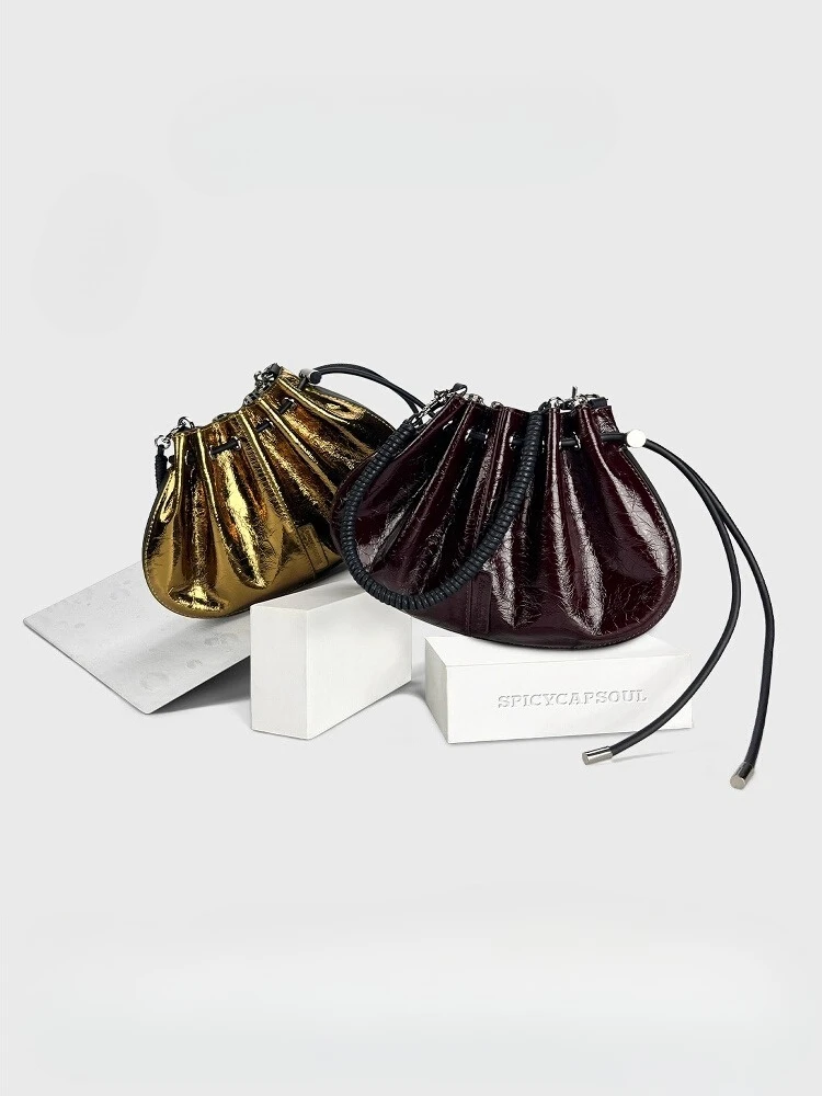 

Retro first-layer cowhide thousand gold cloud wealth bag, portable messenger