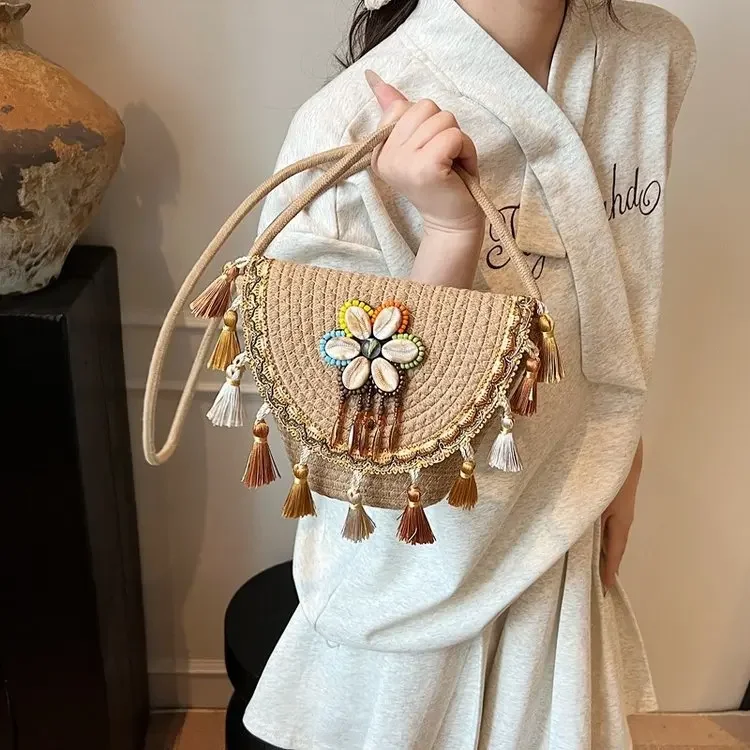 

2026 Woven Fringe Women's Crossbody Bag Ethnic Style Shoulder Textured Bucket Bag for Vacation Foreign Style