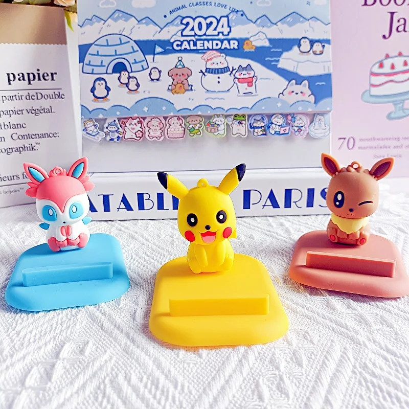 Pokemon Kawaii Lazy Mobile Phone Bracket Pikachu And Eevee Family Light Portable Model Can Also Be Used Desktop Decoration Gift