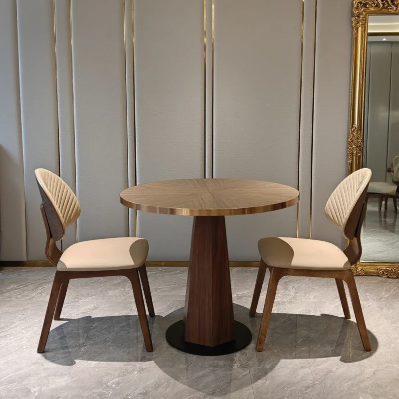 

Black walnut round dining table All solid wood round table Nordic hotel furniture Stainless steel gold hemming table and chair