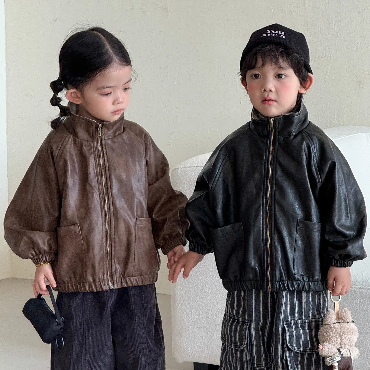 Childrens Leather Jacket with Plush and Thickened PU Jacket for Boys and Girls 2026 New Autumn and Winter Baby Top for Girls