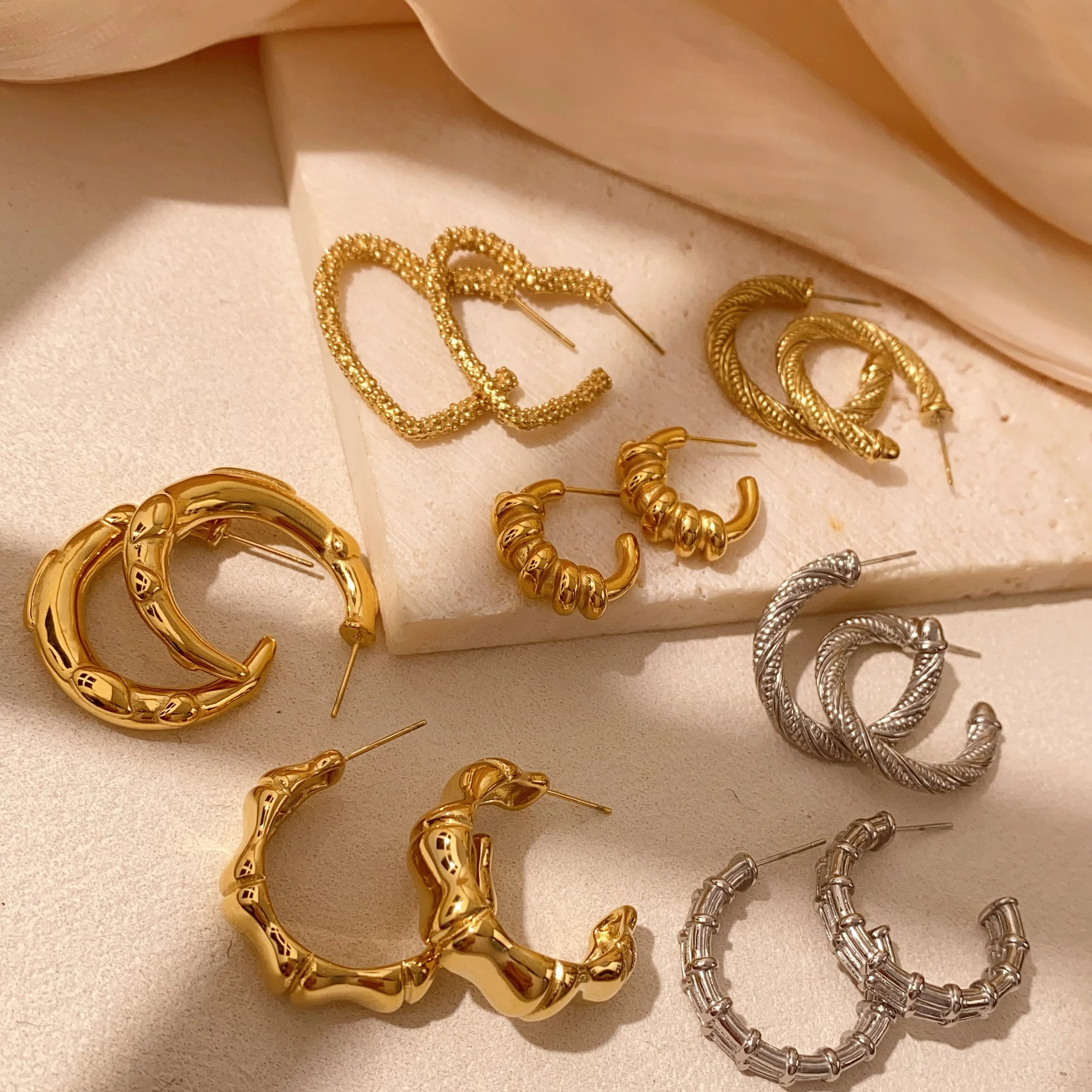 

CARLIDANA Ins Popular Waterproof Jewelry Stainless Steel Gold Plated C Shaped Earrings Twisted Large Hoop Earrings for Women