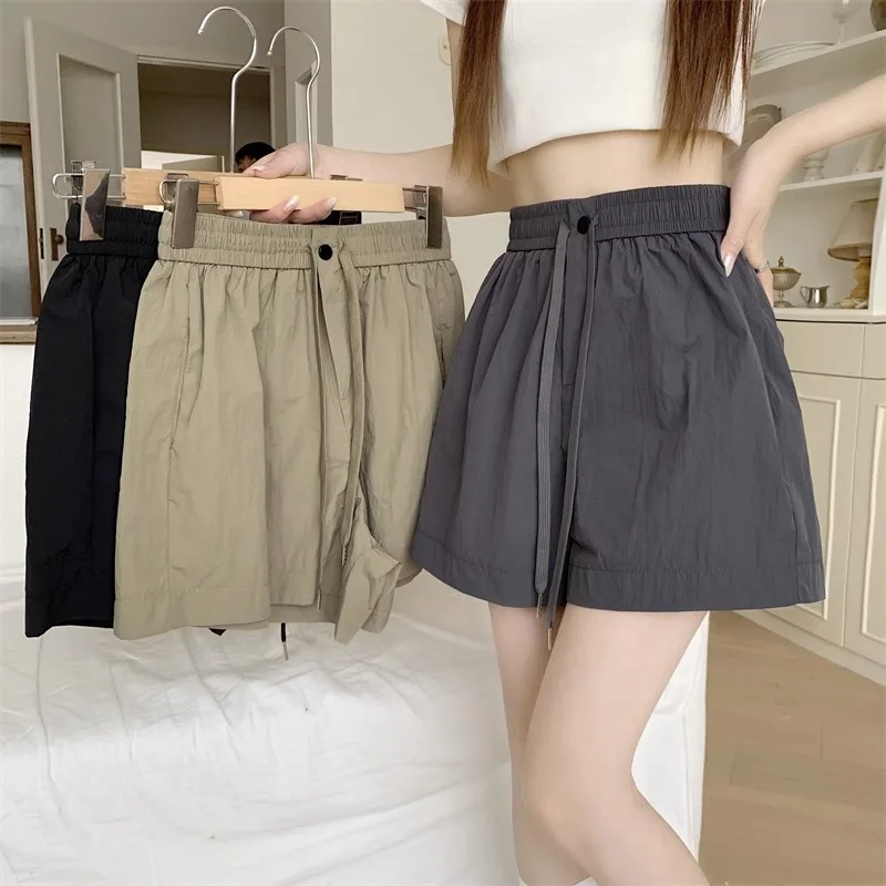 Pantalones cortos para mujer Y2K Denim Harajuku Vintage tiro bajo caliente Mini cadera envuelto ropa de calle azul moda botín pantalones de verano europeos