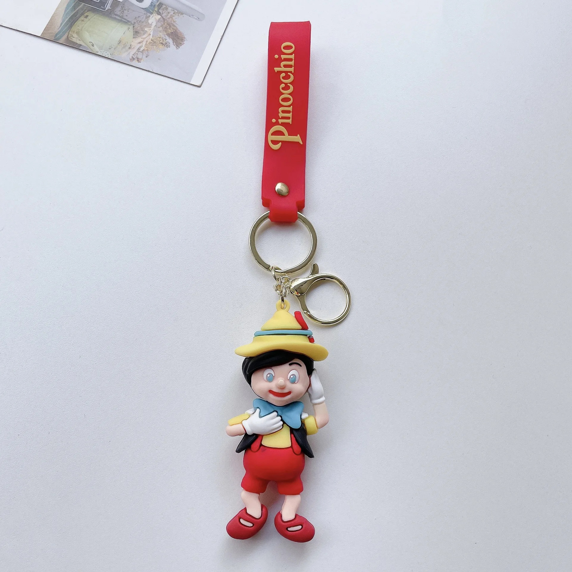 Creative cartoon new Cartoon Pinocchio Key chain creative old carpenter lying long nose boy key bag pendant