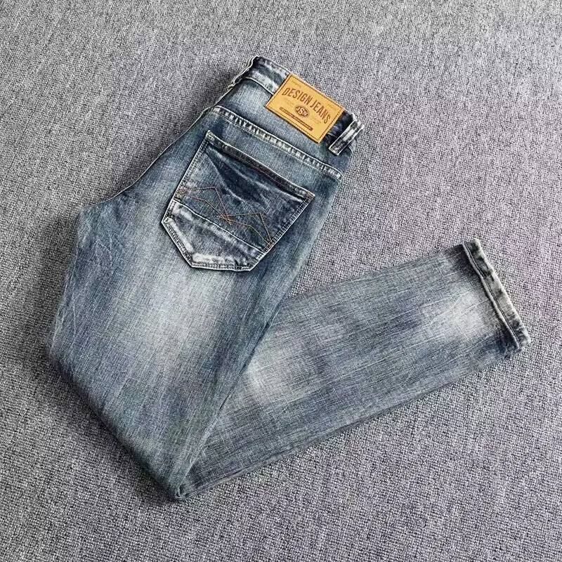 Nowo designerskie modne dżinsy męskie sprany niebieski Retro elastyczne Slim Fit porwane jeansy męskie spodnie modny projektant spodnie dżinsowe Hombre