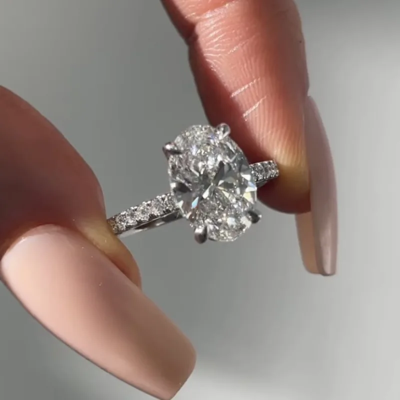 Exquisite ovale Geometrie, silberfarbene Ringe für Damen, modischer Ring mit eingelegten weißen