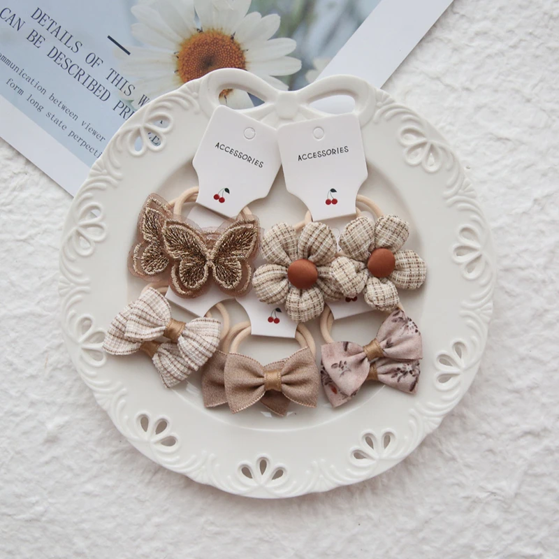 10 stuks kinderbloem haaraccessoires haarboog hoofddeksels touw schattige meisjes haarbanden trendy handgemaakte elastische mooie haarbanden