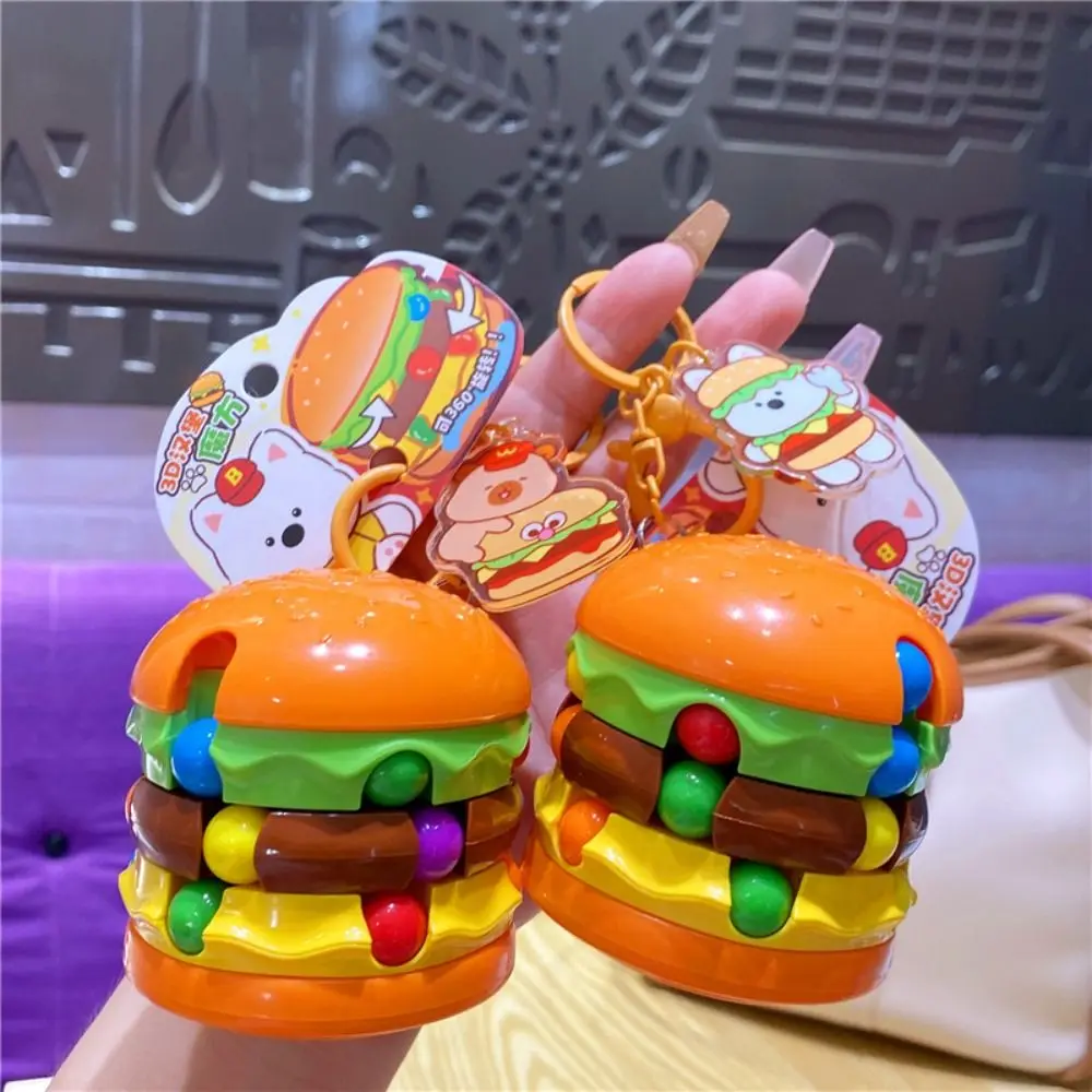 

Plastic Dog Hamburger Doll Key Chain Anti-lost Finger Top Hamburger Magic Bean Cube Girl Heart 3D Capybara Puzzle Cube Keychain