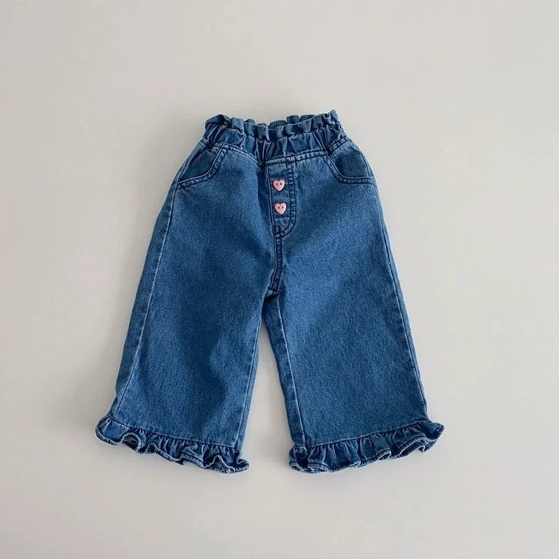

2026 Autumn Girl Baby Ruffle Pockets Jeans Children Pockets Casual Denim Pants Kid Cotton Loose Fashion Trousers Infant Clothing