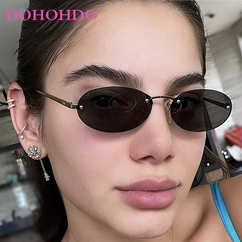 

Fashion Luxury Designer Sun Glasses Women Men Popular Rimless Metal Oval Eyewear Summer Traveling Driving Shades UV400 Occhiali