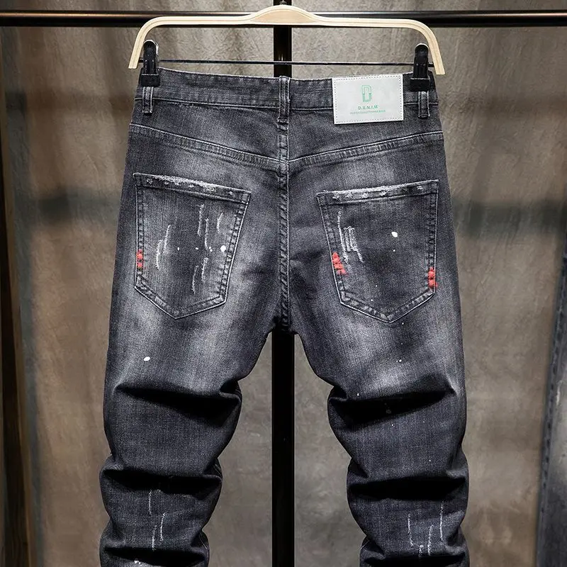 Harajuku celana Jeans Hip-Hop pria, baju gaya Korea Mewah Trendi Slim Fit ramping dengan lubang dan tambalan hitam bergaya Korea 2023