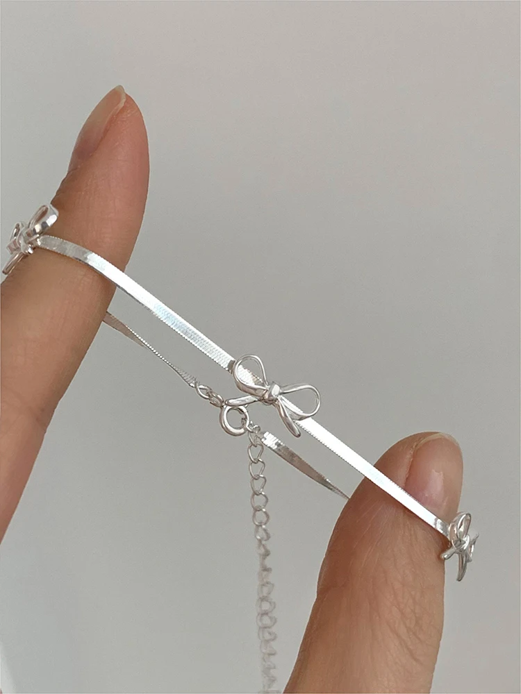 

Dawn's Jewel S925 Sterling Silver Bow Snake Bone Bracelet Female Light Luxury Elegant Niche Fashion Hand