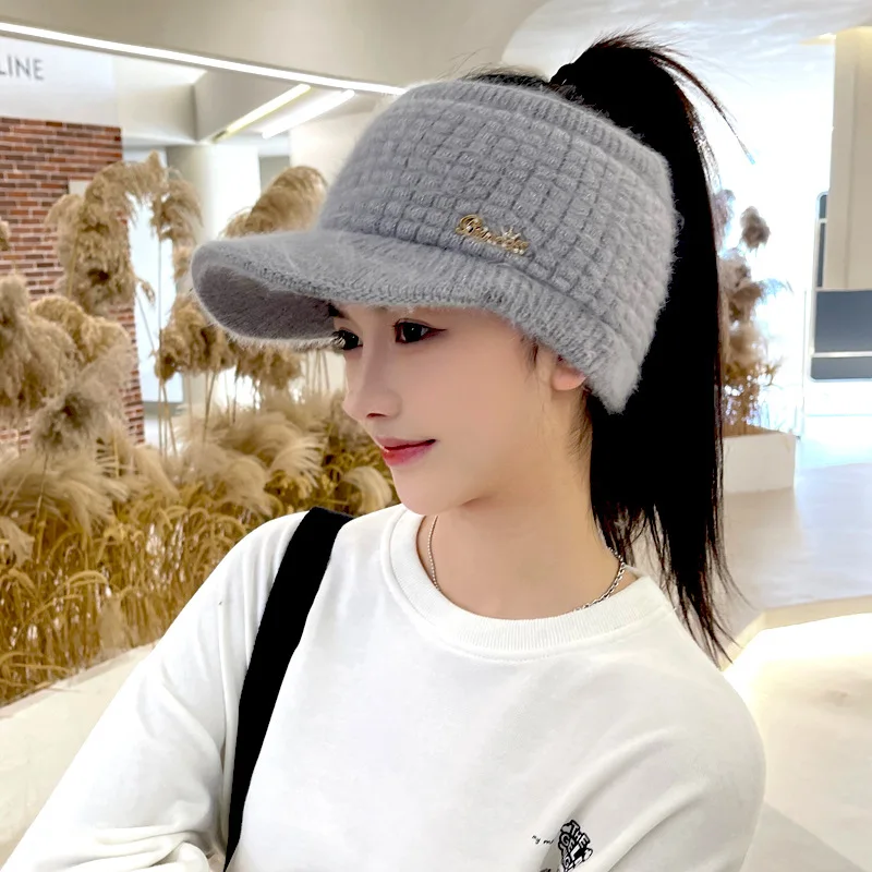 Autumn and winter women\'s ponytail cap sports leisure knitted wool cap solid color warm students duck tongue cap plush cap