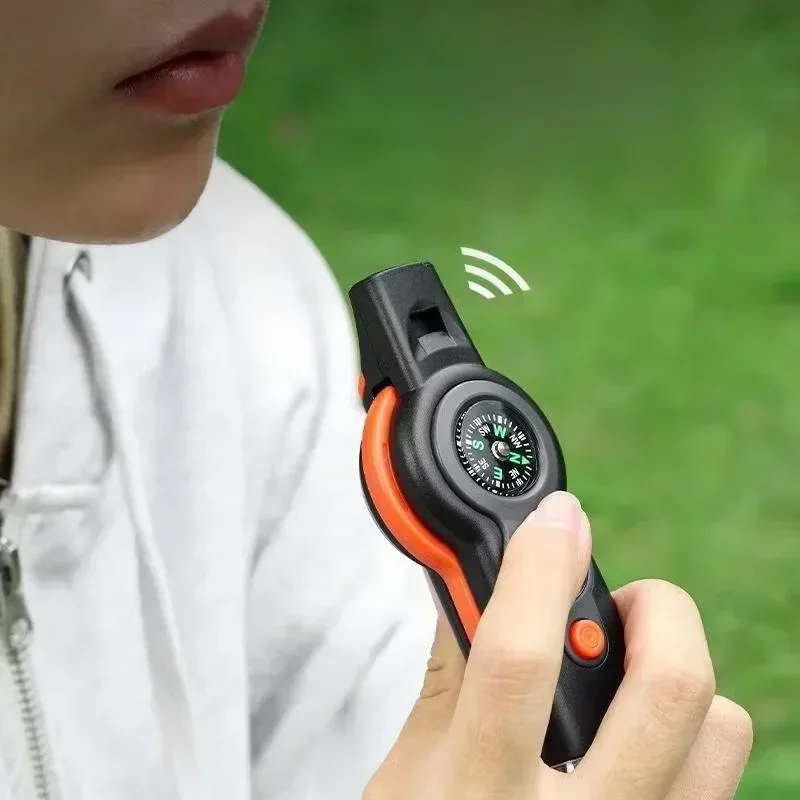 7 in1 Outdoor Survival Whistle เครื่องมือฉุกเฉิน Camping Hiking Rescue ฉุกเฉิน Loud Whistle เข็มทิศเครื่องวัดอุณหภูมิแว่นขยาย