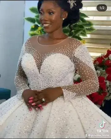 Customized New High Quality Hot Selling Long Sleeved Round Tie Pearl Bride Elegant Wedding Dresses
