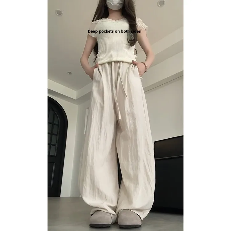 กางเกงลำลองผ้าลินินสไตล์เกาหลีสำหรับผู้หญิง รุ่นใหม่สำหรับฤดูร้อน เนื้อผ้าเบาสบาย ระบายอากาศได้ดี ทรงหลวม ช่วยให้ดูผอมเพรียว ยาวคลุมเท้า