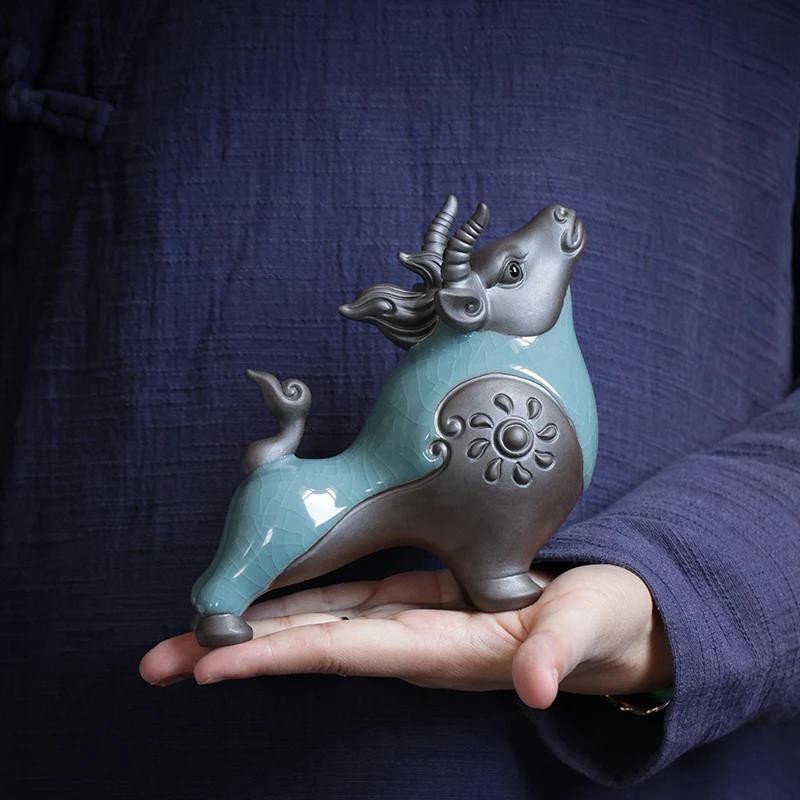 Ceramic bull spirit charm pieces brother kiln open pieces can raise tea pet cattle tea room tea ceremony decoration