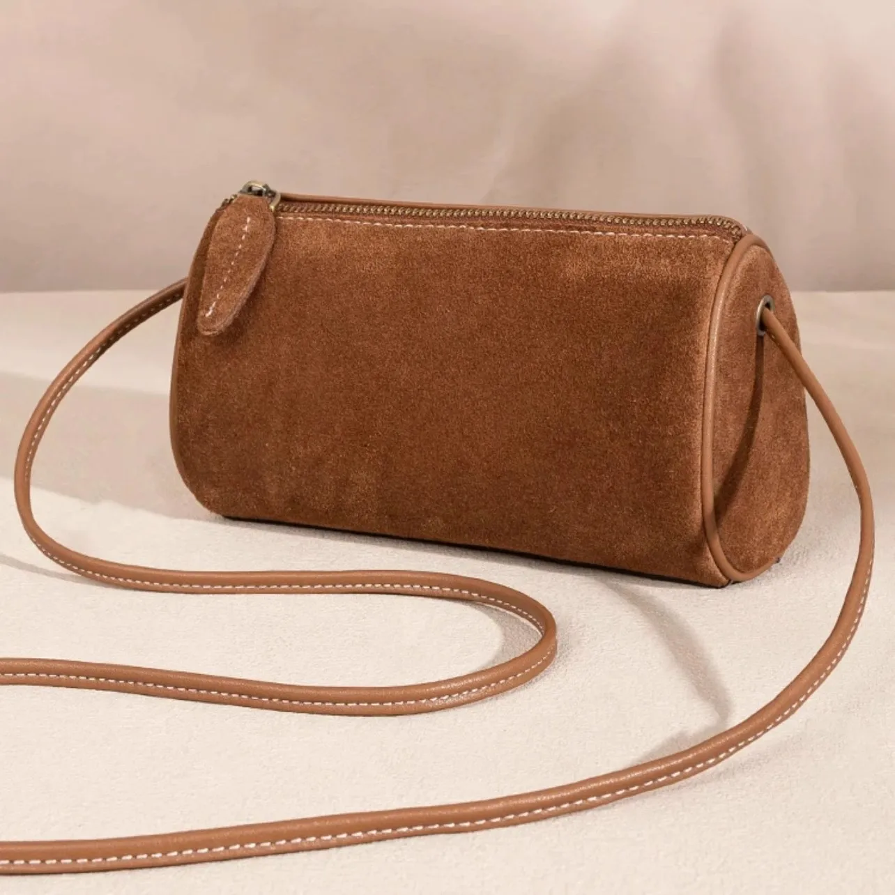 

2025 autumn and winter new retro suede cylinder bag suede matte single shoulder oblique span women's bag small round bag