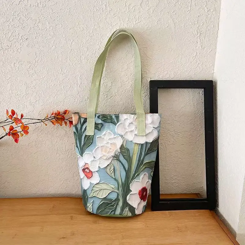 2025 تصميم جديد الأزهار دلو حقيبة المرأة الكتف Crossbody النفط اللوحة زهرة تصميم عارضة أزياء سعة كبيرة حمل حقيبة