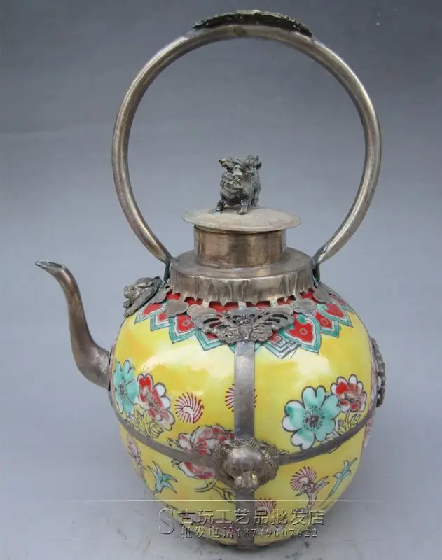 

Early years handicrafts patterned brass wholesale Miao silver portable teapot imitation ceramic wrapped silver, yellow pattern