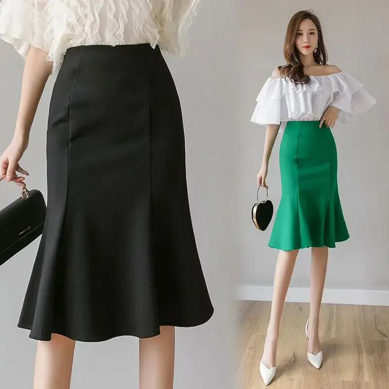 La gonna altalena svasata alla moda versatile quattro stagioni da donna mostra la gonna con borsa professionale a metà corpo a vita alta con temperamento sottile