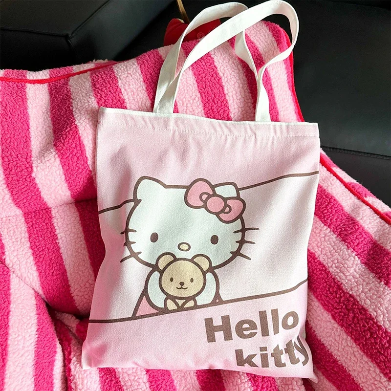 Bolsa de lona Kawaii Sanrio Hello Kitty Cinnamoroll, bolso de dibujos animados de Anime para estudiantes, bolsa de almacenamiento de libros al aire libre con cremallera, regalos para niñas