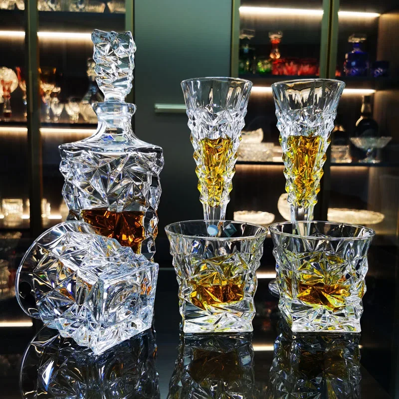 

Crystal glass barware set with a glass of whiskey bottle