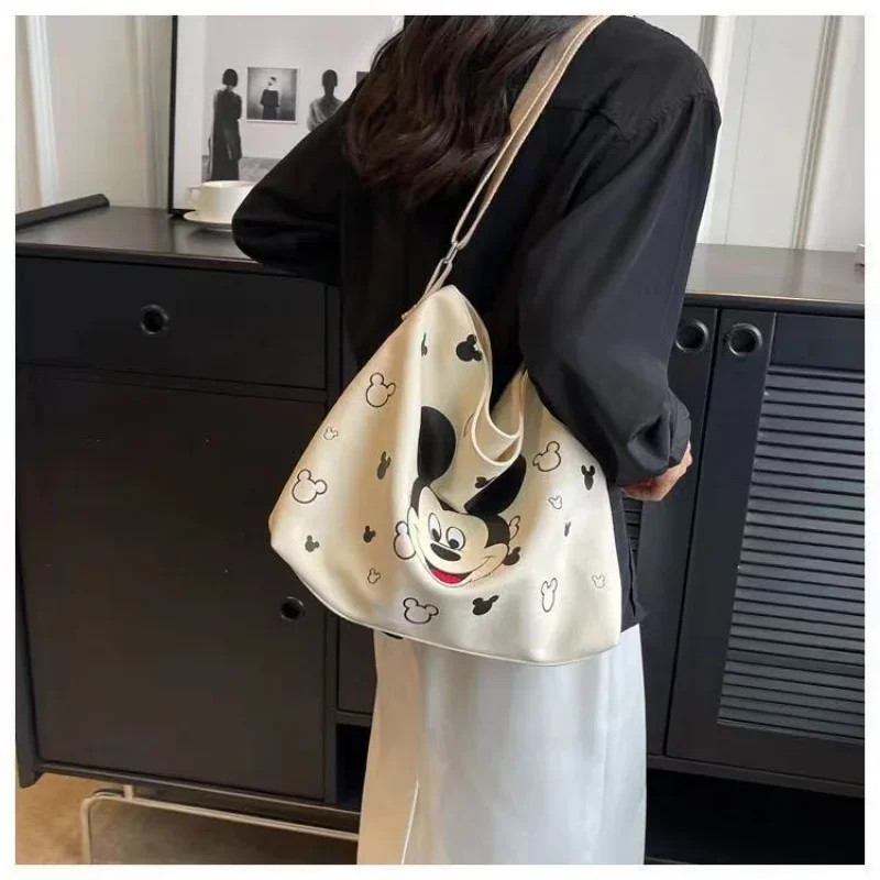 Borsa a tracolla in tela semplice Disney Mickey borsa a tracolla leggera di grande capacità per studenti con stampa di cartoni animati