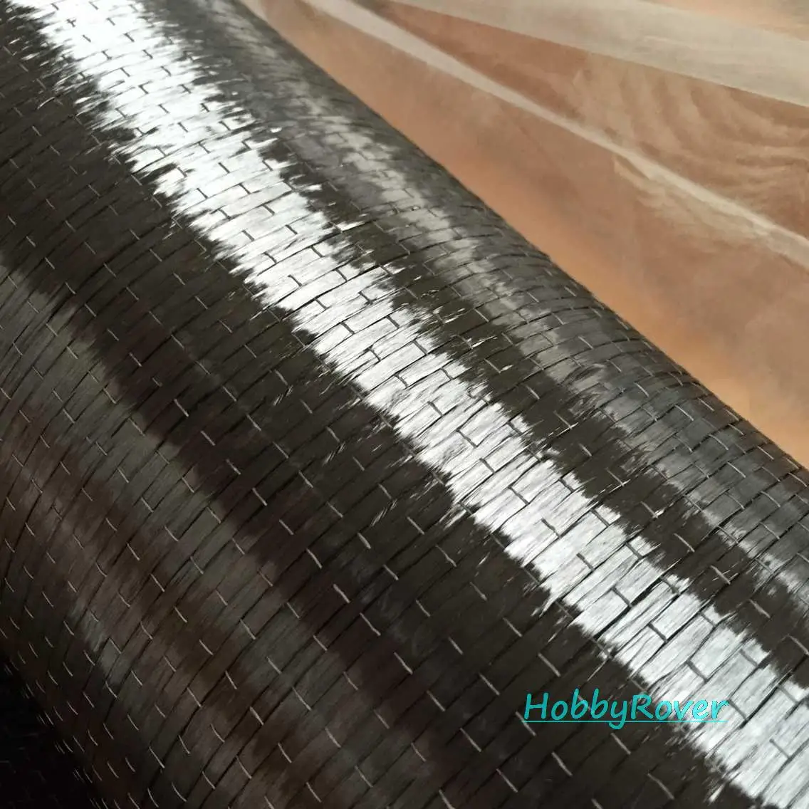 

T700 300gsm 20"/50cm width 12k UD Uni-directional Carbon Fiber Fabric Cloth Tap High strength house Repair material Bulk sales