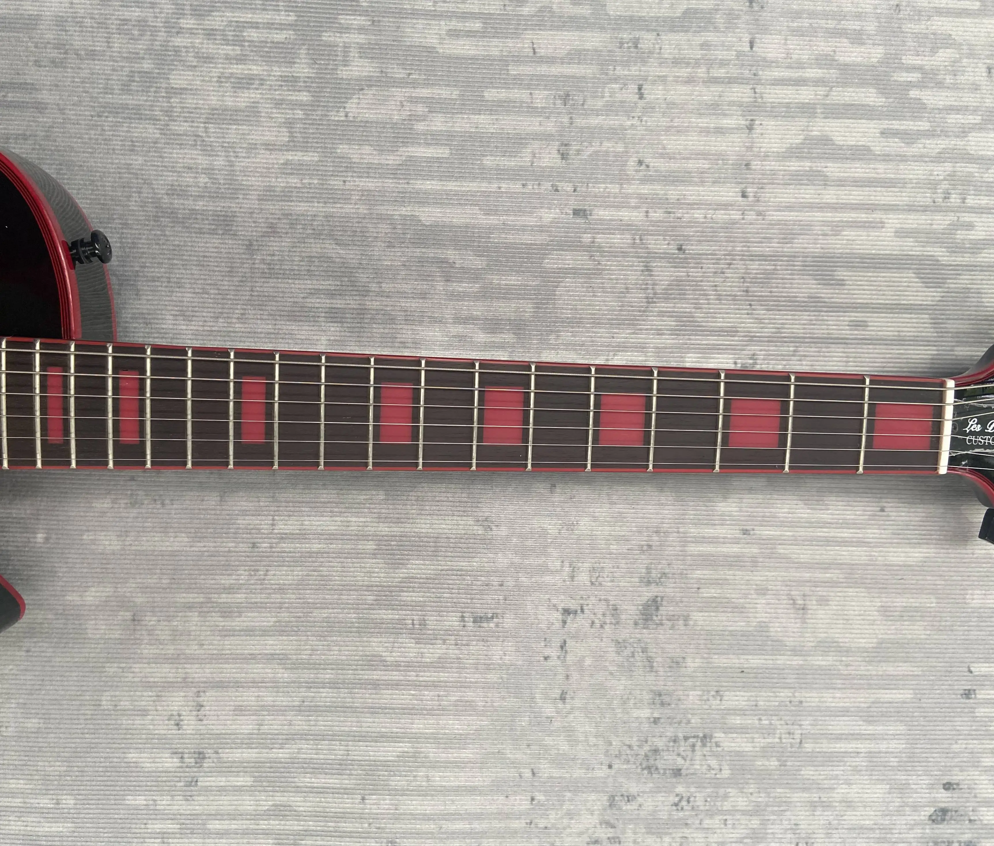 NEW!guitar, Red large floral veneer, red scale, mahogany body, have logo. Rosewood fingerboard, Made in China, G6