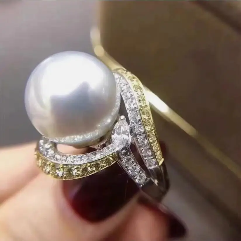 

Классическое кольцо с идеальным круглым белым жемчугом Южного моря 11-12 мм 925s