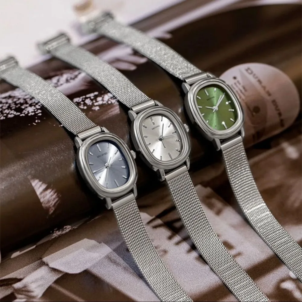 新しいオーバルダイヤルレディースウォッチグリーンステンレススチールレディース腕時計パープルクォーツウォッチギフト