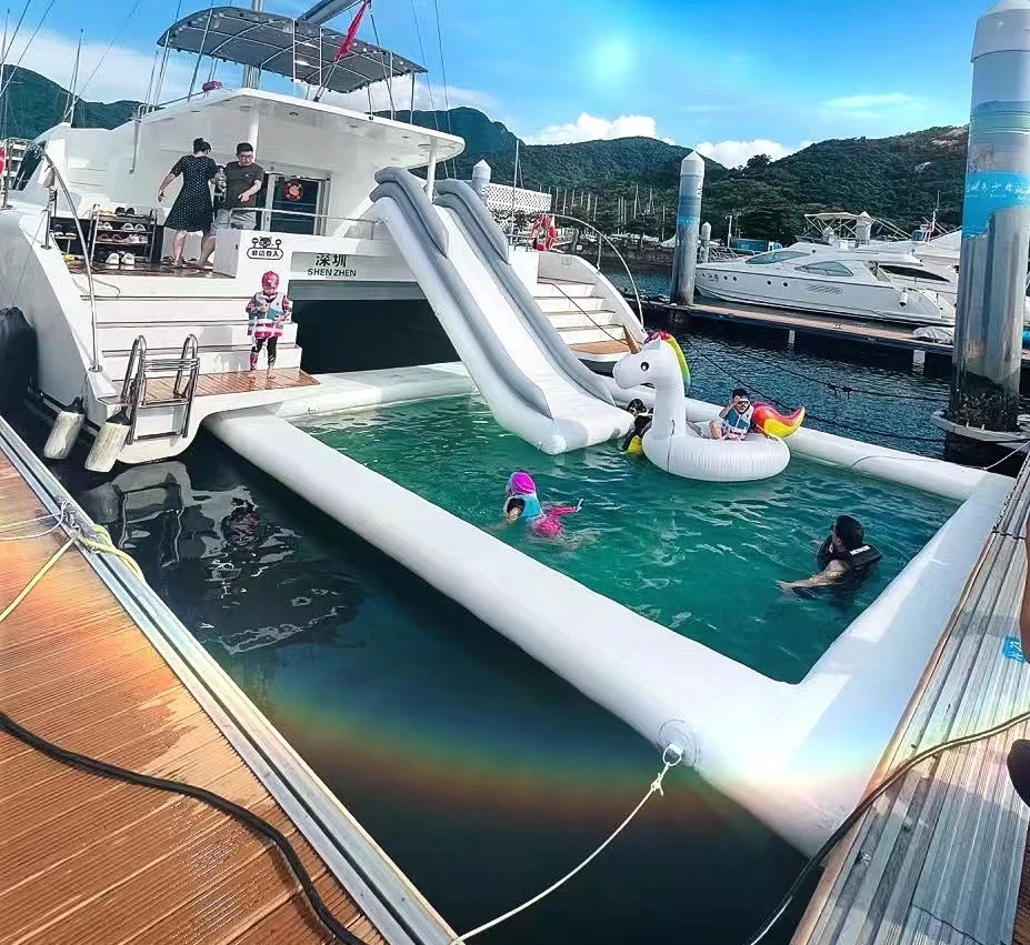 

High-end yacht slide Inflatable floating swimming pool Ocean seawater swimming pool with jellyfish net
