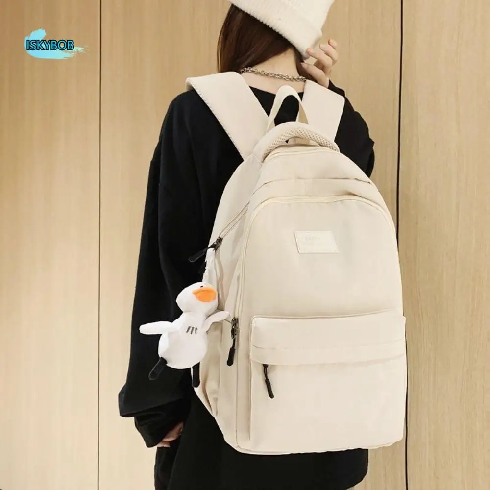 

Kawaii Duck Pendant Solid Color Backpack Korean Style Handbag Students School Bag Travel Bag Nylon Shoulder Bag Gifts
