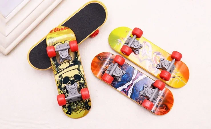 

Hot Sale 1PC Cute Kids Children Mini Fingerboard Skate Boarding Toys Children Gifts Party Favor Toy Random