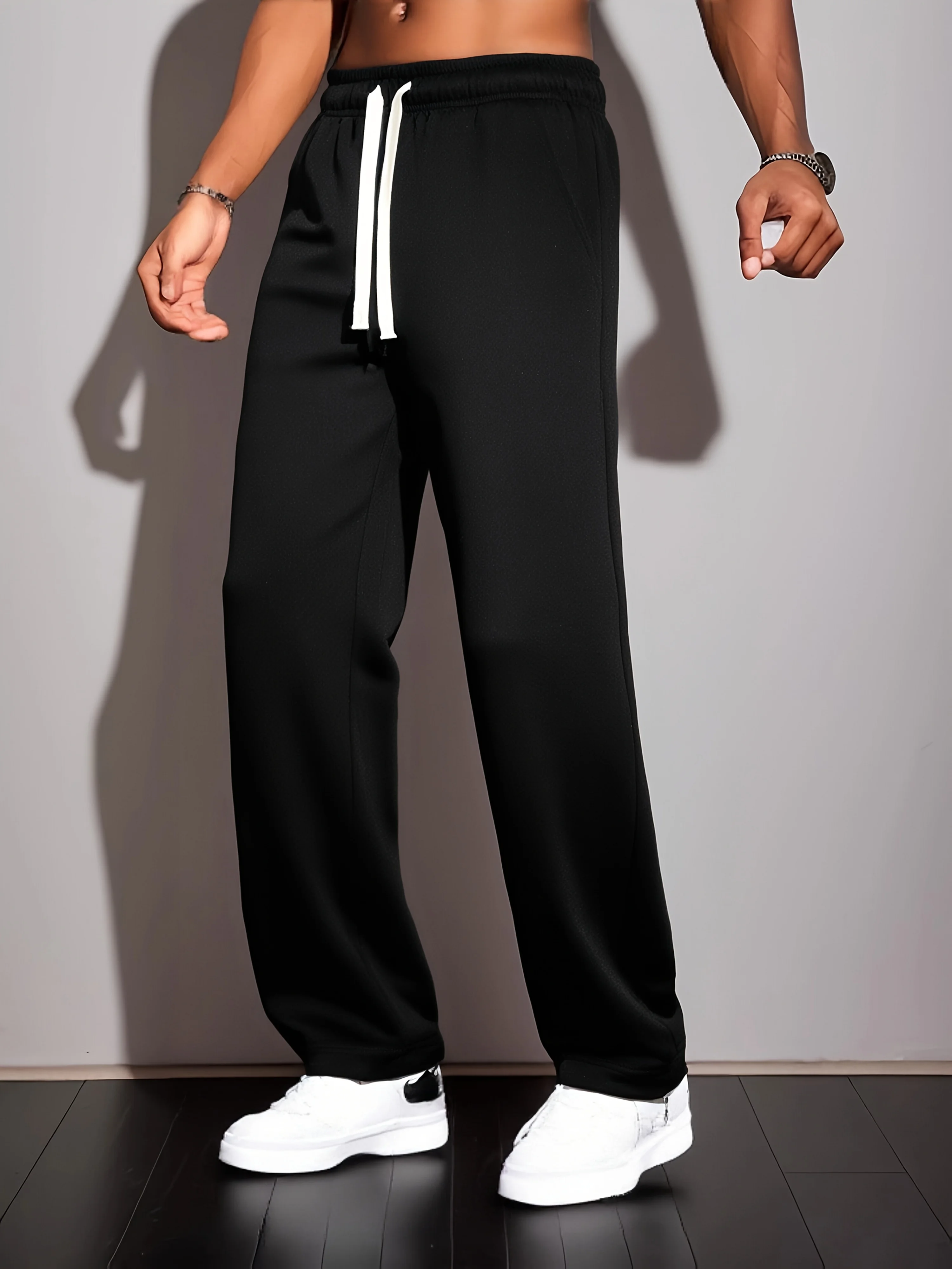 سروال رجالي أنيق للخريف والشتاء بلون سادة وخصر مطاطي واسع الساق مقاس كبير مناسب لكل من الرياضة والأنشطة الخارجية