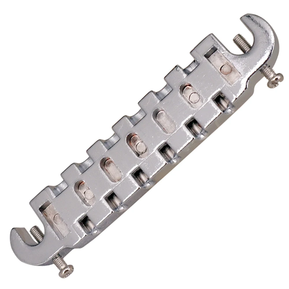 Optimal String Spacing and High Intonation with Guitar Compensated Ridge Wraparound Combination Bridge Tailpiece